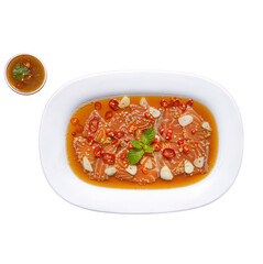 A vibrant dish featuring slices of fish garnished with herbs, tomatoes, and a flavorful sauce, served in an elegant white bowl.