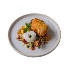 A delicious plate featuring crispy chicken, creamy poached egg, and a medley of vegetables, garnished with herbs.