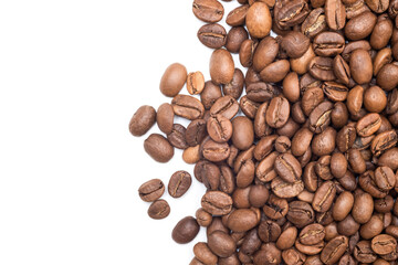 Roasted coffee beans on white background, top view