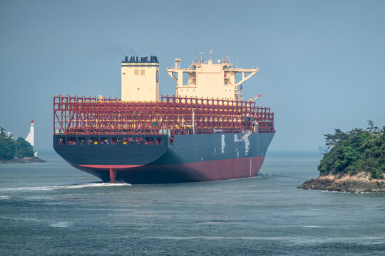 A newly built empty container freight ship