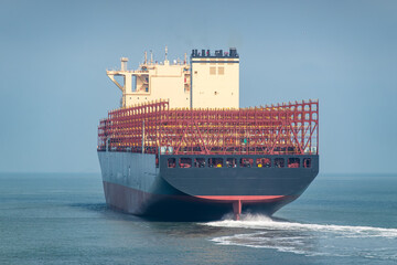A newly built empty container freight ship