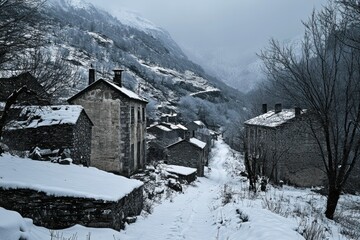 Snow Covered Stone Houses in a Mountain Valley