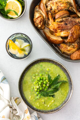 Creamy broccoli and green pea soup with mint, baked chicken with pears and thyme, delicious healthy lunch