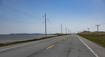 Fototapeta premium Route entre mer et dune, jour, horizontal