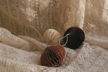 Christmas, New Year composition. Aesthetic Scandinavian Christmas paper honeycomb baubles on...