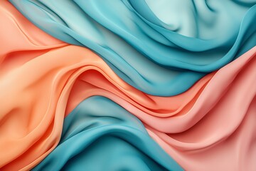 Fototapeta premium A vibrant blend of flowing silk fabric in shades of blue and peach, creating a soft, elegant texture for artistic designs.