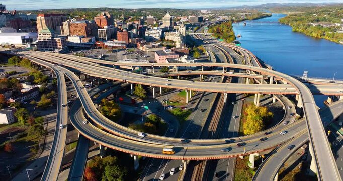 Aerial view of twisting highway in downtown Albany New York. Multi-level highway interchange with bridges and overpasses.