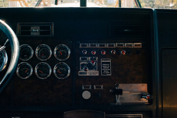 The interior of the cabin of a new modern truck. steering wheel, pedals, seat included, multimedia