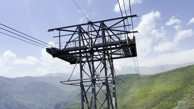 Airview from cable car in the longest ropeway cabin Wings of Tatev between Halidzor and Tatev monastery on canyon in spring time. Up the hill in nature park
