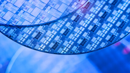Silicon Wafers with microchips used in electronics for the fabrication of integrated circuits