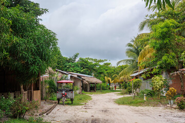 Streets and houses in the Peruvian jungle, in the community of Independencia in Iquitos, Peru.