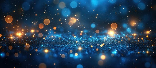 Fototapeta premium Abstract blue and gold bokeh background with sparkles and glitter.