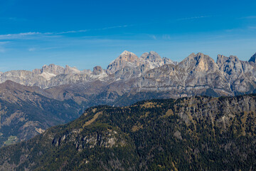 Aerial view of the Dolomites. Mountain landscape from above. Rocky peaks and mountain summits in the Alps scenic aerial view