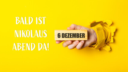 Person holding a block of wood