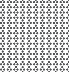 Simple colorful polka dots on a white background. Vector seamless pattern.