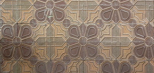 Colorful sidewalk tiles with geometric shapes in an urban environment. View of colorful sidewalk...