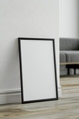Blank Frame Against White Wall In Modern Room