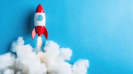 Toy rocket ascending with smoke against a vibrant blue background, representing innovation, success, and inspiration in startup education and knowledge.