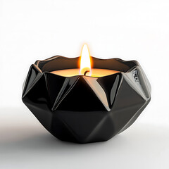 A lit candle placed inside a geometric black ceramic holder
