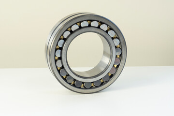 Rolling bearing close-up. New silver car part. Friction bearing.
