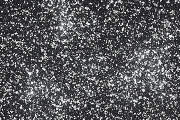 Black and white glitter background, silver sparkling texture for design or decoration.