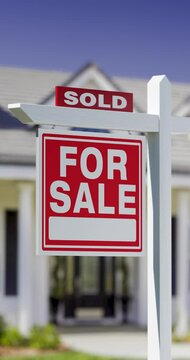 4k Slow Upward Crane of Sold For Sale Real Estate Sign in Front of New House.