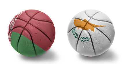 basketball balls with the national flags of cyprus and belarus on the white background.