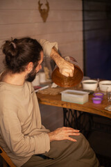 man working on laptop and tea