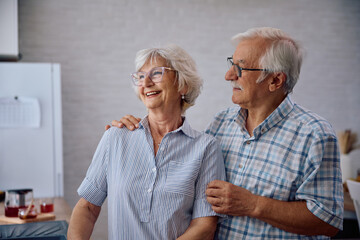 Happy senior couple enjoying in relaxing day at home.