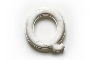 A close-up shot of a toilet seat on a white surface