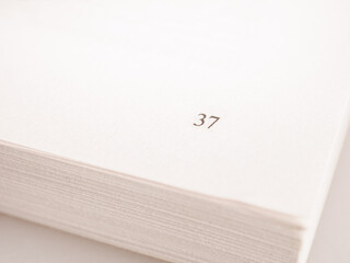 Close-up of a book page capturing text. Ideal image for literature, reading and education themes