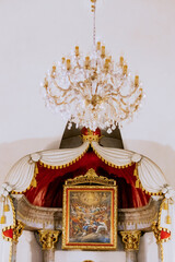 A painting in a church, an altar in a church, holy mass, architectural detail, religious decoration, faith, apostasy, golden details, Polish church