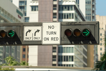 Overhead traffic lights high above street in Miami, Florida