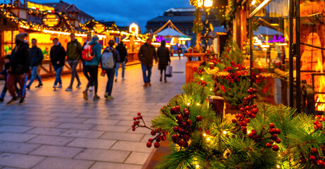 Obraz premium Darmstadt Christmas market with Christmas decorations and Christmas huts with beautiful lighting. Traditional German Christmas market