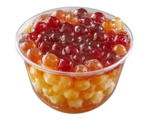 a bowl of food with red and yellow balls