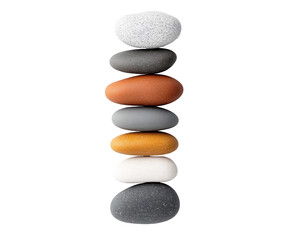 Fototapeta premium Colorful stones in vertical arrangement on clear background