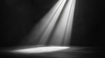 Obraz premium Two intense beams of light break through the darkness, illuminating a mysterious spot on stage, creating a dramatic and suspenseful atmosphere full of intrigue.