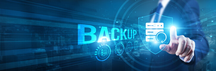 Businessman hand touches a shield, Backup security system strategy. The concept represents...