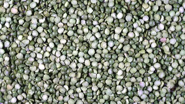 Green split peas background rotating