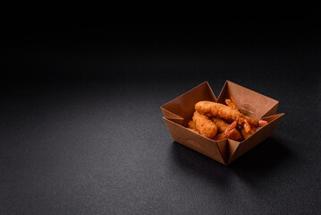 Hot crispy shrimp breaded with salt and spices with white sauce