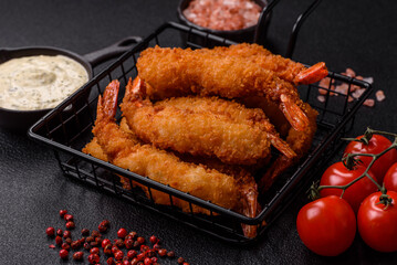 Hot crispy shrimp breaded with salt and spices with white sauce