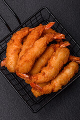 Hot crispy shrimp breaded with salt and spices with white sauce