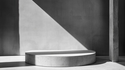 Minimalist grey concrete podium with sunlight and shadows.