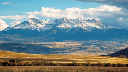 Majestic Snow-Capped Mountains in Autumnal Valley