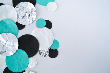 Black, teal and silver paper dots	