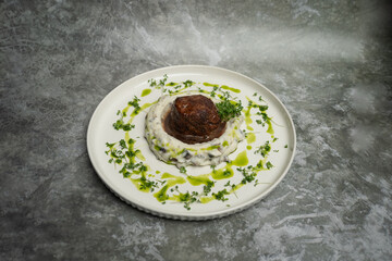 Filet mignon steak with potato cream and truffle
