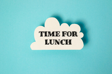 White cloud with the words time for lunch written in black