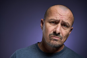 Man with a skeptical expression