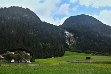 Austrian Alps - view of the Mischbach waterfall  near village Gasteig in Stubai Alps