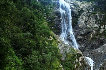 Austrian Alps - view of the Mischbach Waterfall near village Gasteig in Stubai Alps